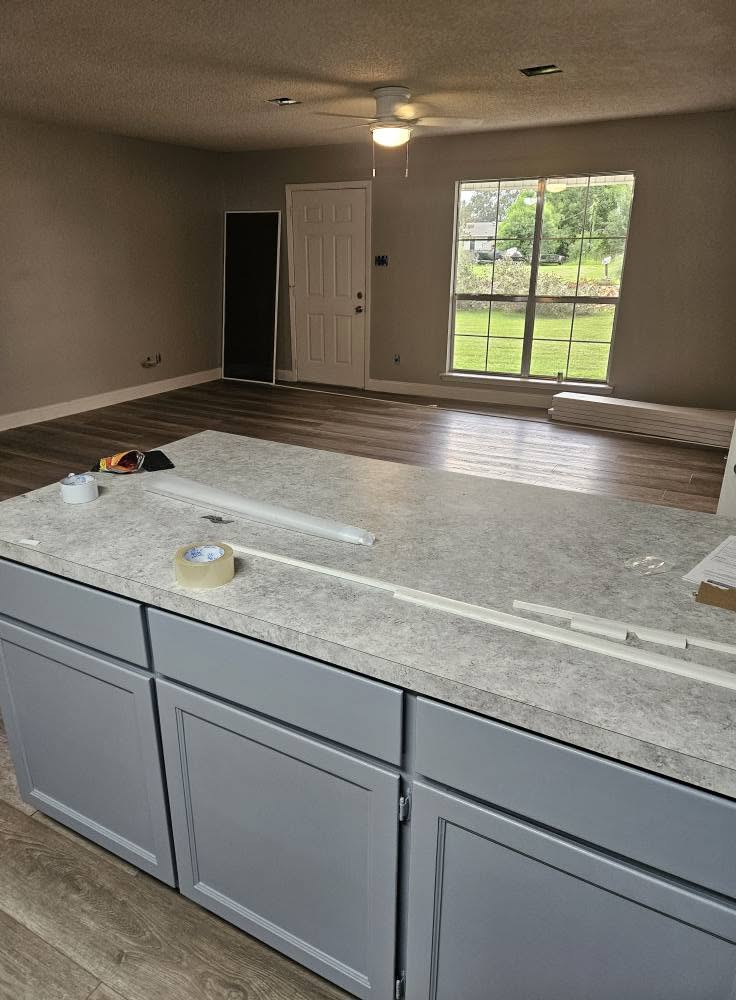 Residential luxury vinyl plank flooring installation completed by Floor Masters of Acadiana.
